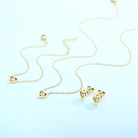 Parure cœur en acier titane plaqué or